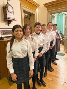 Lathallan pupils waiting staff at Lathallan Sports Dinner 2022